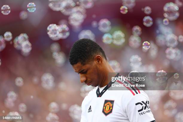 Marcus Rashford of Manchester United takes to the field through the bubbles prior to the Premier League match between West Ham United and Manchester...