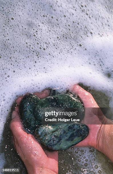 pacific jade stones. - jade foto e immagini stock