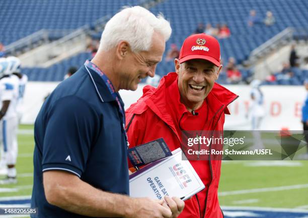 President Daryl Johnston talks with head coach Mike Riley of the New Jersey Generals prior to a game against the New Orleans Breakers at Tom Benson...
