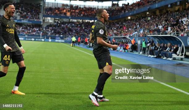 Kylian Mbappe of Paris Saint-Germain celebrates his first goal during the Ligue 1 match between ESTAC Troyes and Paris Saint-Germain at Stade de...