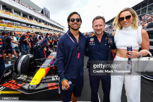Diego Osorio, Red Bull Racing Team Principal Christian Horner and Lindsey Vonn pose for a photo on the grid prior to the F1 Grand Prix of Miami at...