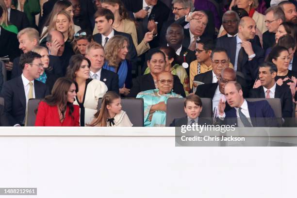 Catherine, Princess of Wales, Princess Charlotte of Wales, Prince George of Wales and Prince William, Prince of Wales are seen during the Coronation...