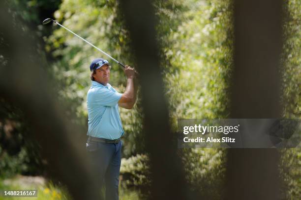 Stephen Ames of Canada hits a tee shot on the ninth hole during the final round of the Mitsubishi Electric Classic at TPC Sugarloaf Golf Course on...