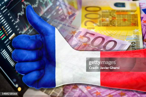 thumb up with france flag, stock market indicators and cash euro bills - french culture stock illustrations ストックフォトと画像