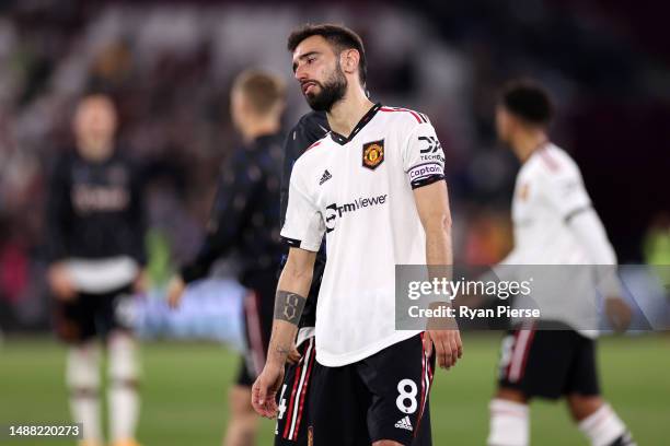 Bruno Fernandes of Manchester United reacts to defeat after the Premier League match between West Ham United and Manchester United at London Stadium...