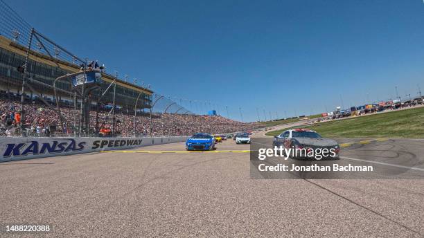 William Byron, driver of the Liberty University Chevrolet, and Kyle Larson, driver of the HendrickCars.com Chevrolet, plthe NASCAR Cup Series Advent...