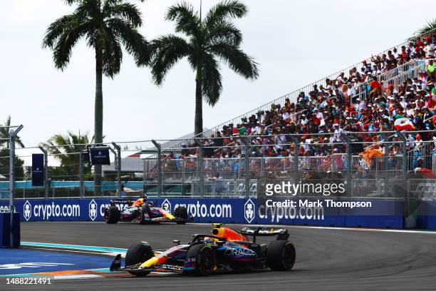 Sergio Perez of Mexico driving the Oracle Red Bull Racing RB19 leads Max Verstappen of the Netherlands driving the Oracle Red Bull Racing RB19 during...