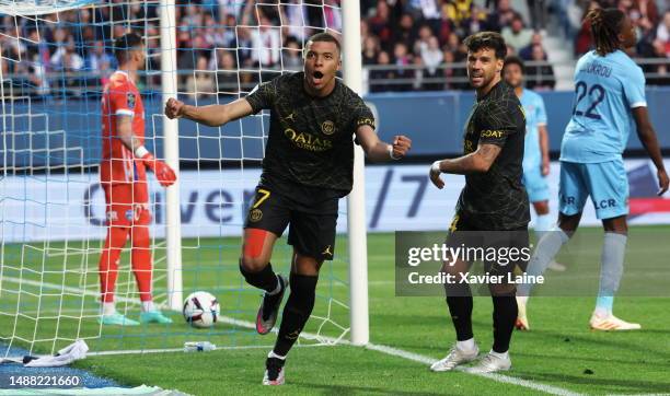 Kylian Mbappe of Paris Saint-Germain celebrates his first goal during the Ligue 1 match between ESTAC Troyes and Paris Saint-Germain at Stade de...