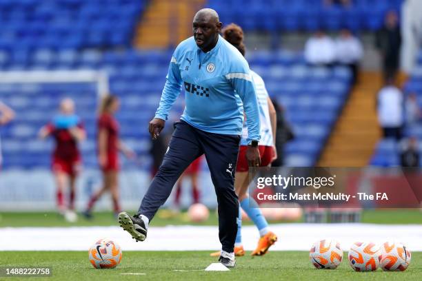 Shaun Goater, coach of Manchester City conducts the warm up during the FA Women's Super League match between Liverpool and Manchester City at Prenton...