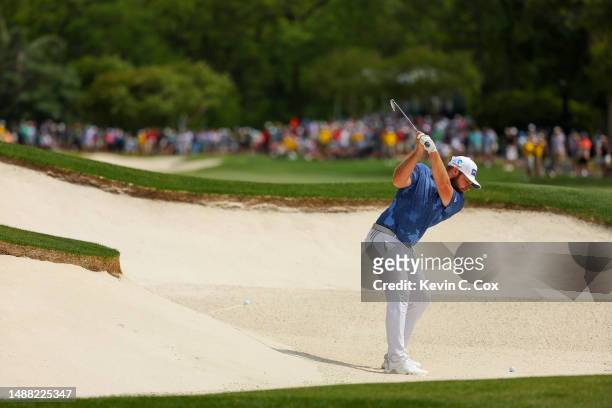 Tyrrell Hatton of England plays a shot from a bunker on the tenth hole during the final round of the Wells Fargo Championship at Quail Hollow Country...