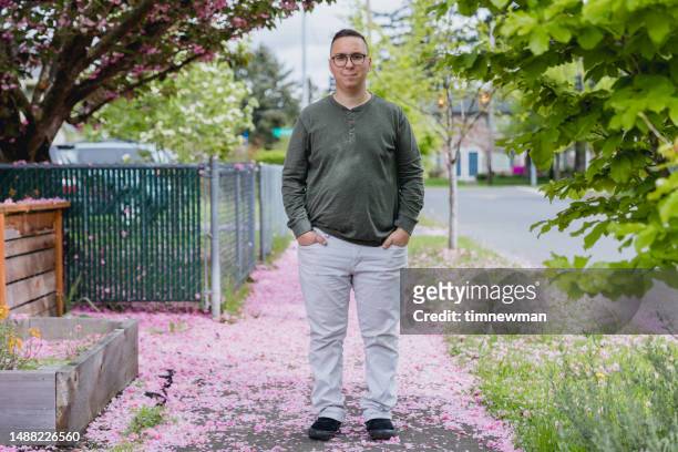 portrait of a mid adult man with autism - autismus stock pictures, royalty-free photos & images