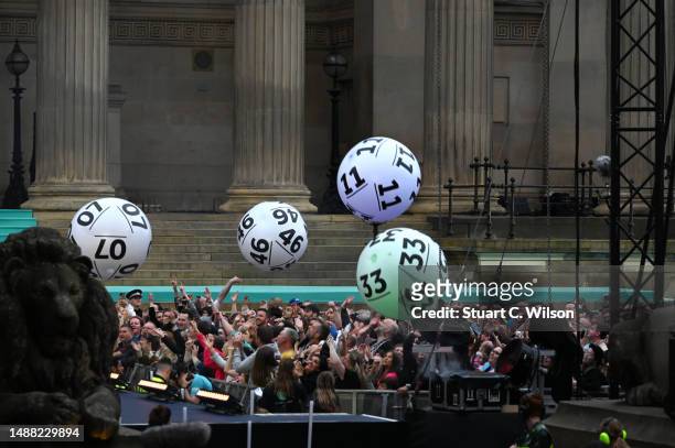 Inflatable lottery balls in the crowd during the National Lottery's Big Eurovision Welcome event outside St George's Hall on May 07, 2023 in...