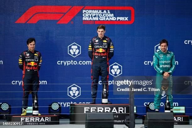 Race winner Max Verstappen of the Netherlands and Oracle Red Bull Racing , Second placed Sergio Perez of Mexico and Oracle Red Bull Racing and Third...