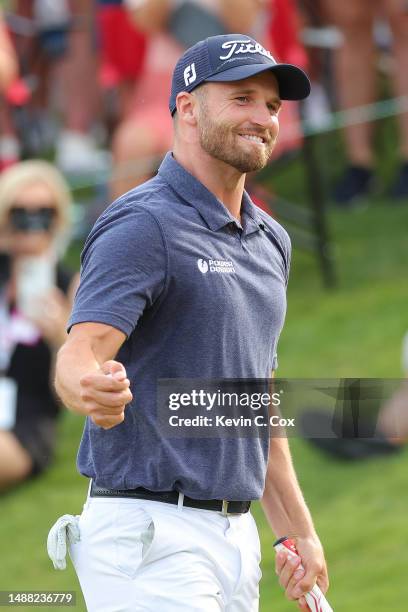 Wyndham Clark of the United States celebrates winning on the 18th green during the final round of the Wells Fargo Championship at Quail Hollow...