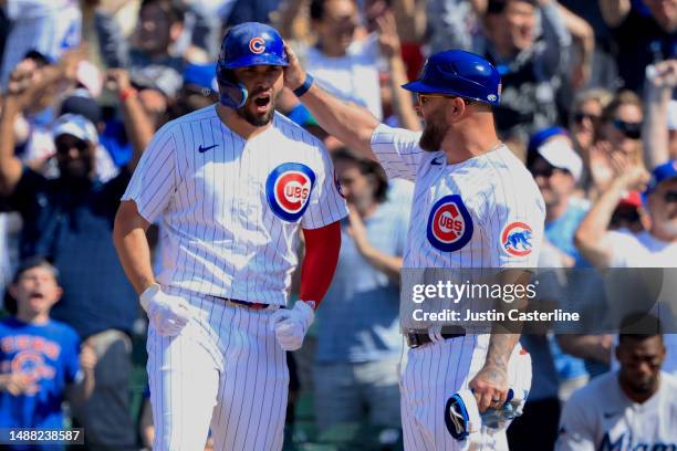 Eric Hosmer of the Chicago Cubs celebrates an RBI single in the ninth inning in the game against the Miami Marlins at Wrigley Field on May 07, 2023...