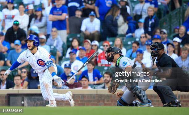 Nick Madrigal of the Chicago Cubs hits a ground ball in the tenth inning against the Miami Marlins at Wrigley Field on May 07, 2023 in Chicago,...