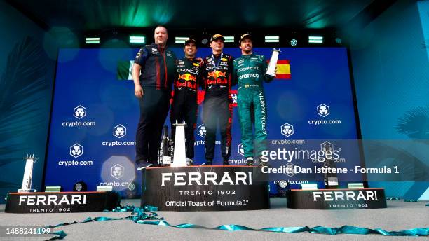 Race winner Max Verstappen of the Netherlands and Oracle Red Bull Racing , Second placed Sergio Perez of Mexico and Oracle Red Bull Racing , Third...