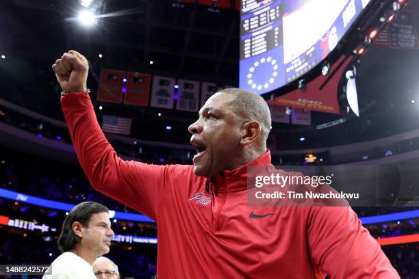 Head Coach Doc Rivers of the Philadelphia 76ers celebrates after defeating the Boston Celtics in overtime of game four of the Eastern Conference...