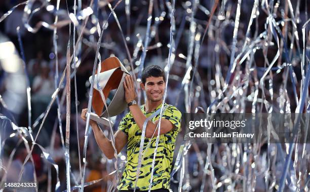 Carlos Alcaraz of Spain celebrates victory with the tournament trophy after the Men's Singles Final match against Jan-Lennard Struff of Germany on...