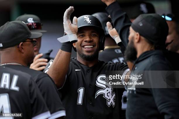 Elvis Andrus of the Chicago White Sox celebrates with teammates after scoring a run in the second inning against the Cincinnati Reds at Great...