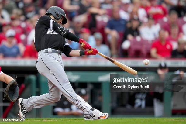 Andrew Benintendi of the Chicago White Sox hits a double in the fifth inning against the Cincinnati Reds at Great American Ball Park on May 07, 2023...