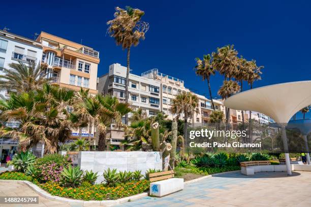 the beautiful promenade of estepona on a clear sunny day, andalusia - estepona stock pictures, royalty-free photos & images