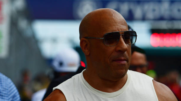 Vin Diesel looks on from the grid prior to the F1 Grand Prix of Miami at Miami International Autodrome on May 07, 2023 in Miami, Florida.