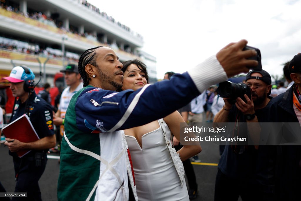 Rodriguez Take Off Ludacris and Michelle Rodriguez take a selfie onthe grid prior to the ...