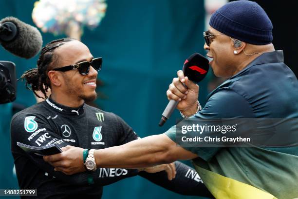 Lewis Hamilton of Great Britain and Mercedes hugs LL Cool J on the grid prior to the F1 Grand Prix of Miami at Miami International Autodrome on May...
