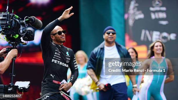 Lewis Hamilton of Great Britain and Mercedes walks out onto the grid prior to the F1 Grand Prix of Miami at Miami International Autodrome on May 07,...