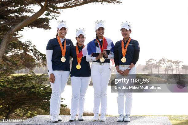 Ariya Jutanugarn, Moriya Jutanugarn, Patty Tavatanakit and Atthaya Thitikul of Team Thailand celebrate after defeating Team Australia during their...