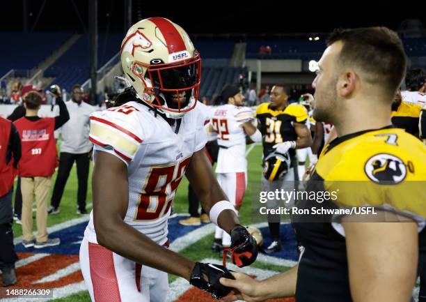 Deon Cain of the Birmingham Stallions and Chris Blewitt of the Pittsburgh Maulers talk after their game at Tom Benson Hall Of Fame Stadium on May 07,...