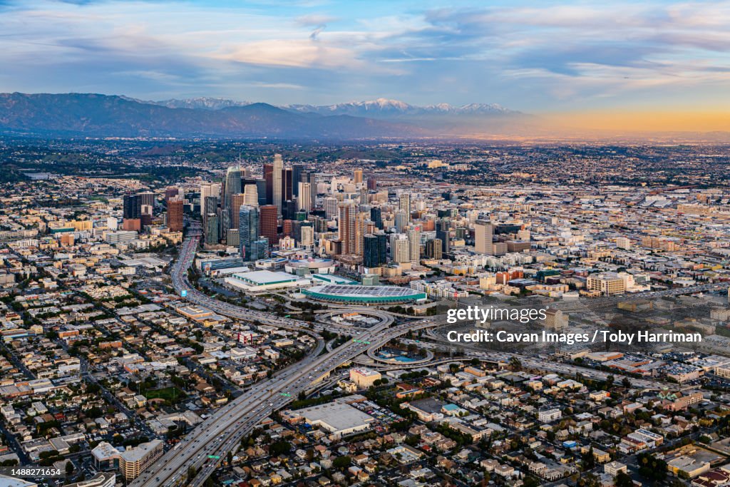 Downtown Los Angeles Snow Peaked Mountains Aerial Sunset