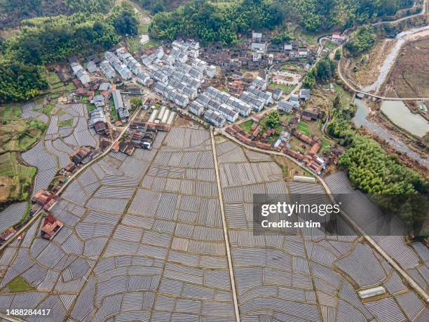 aerial view of small villages and farmland in the morning - small village countryside stock pictures, royalty-free photos & images