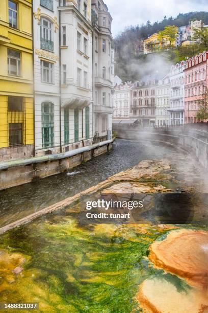 natural hot spring near the river of karlovy vary - karlovy vary stock pictures, royalty-free photos & images