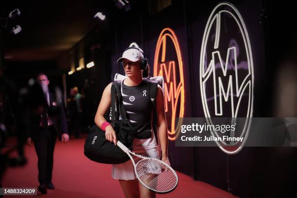 Iga Swiatek of Poland prepares to enter the court to play Bernarda Pera of USA during the women's third round match on Day Seven of the Mutua Madrid...