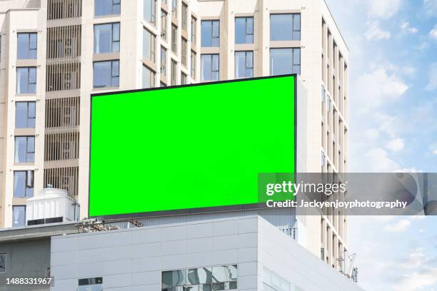 blank electronic advertising screen on front office buildings - billboard poster stock pictures, royalty-free photos & images