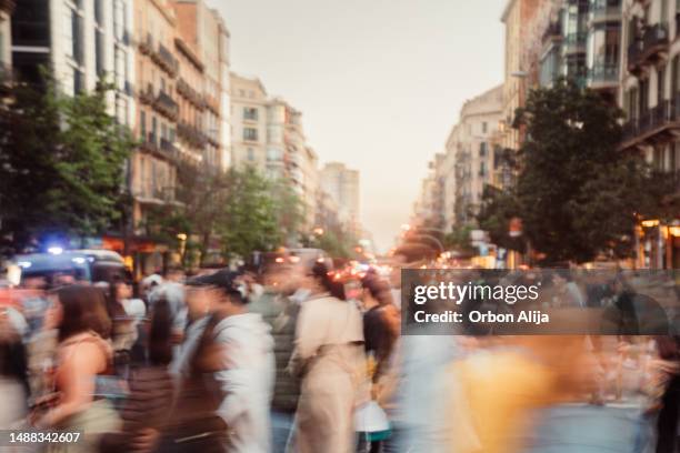 crowd of people walking at zebra crossing. - movimento desfocado imagens e fotografias de stock