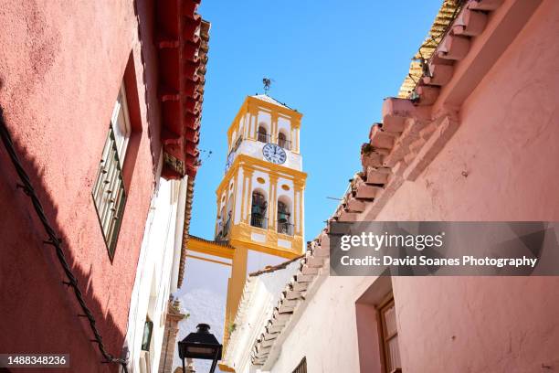 a tower in marbella in andalucia, spain - marbella stock pictures, royalty-free photos & images
