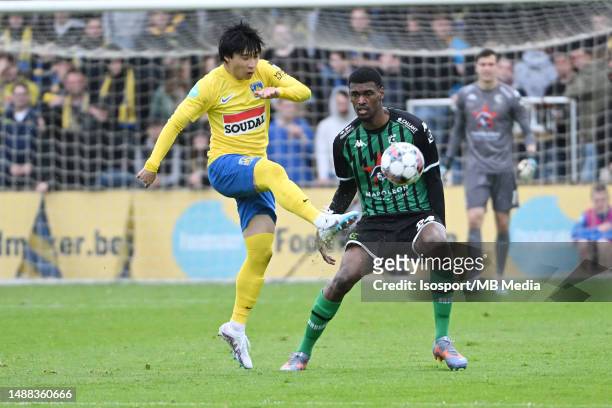 Yusuke Matsuo of Westerlo battles for the ball with Jean Harisson Marcelin of Cercle Brugge during the Jupiler Pro League season 2022 - 2023 Europe...