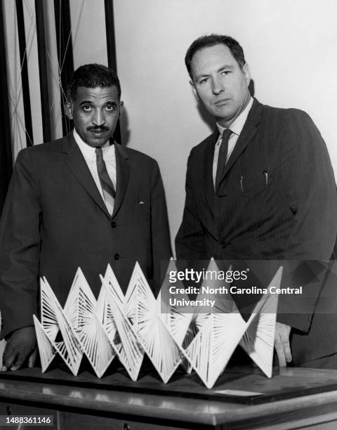 Robert F. Kennedy, new Chairman of the Department of Art at North Carolina College at Durham, standing with North Carolina College President Samuel...