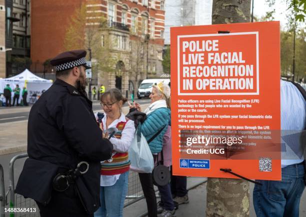 Coronation, London, 6 May 2023. A sign from the Metropolitan Police in London, UK, announcing the use of live facial recognition technology during...