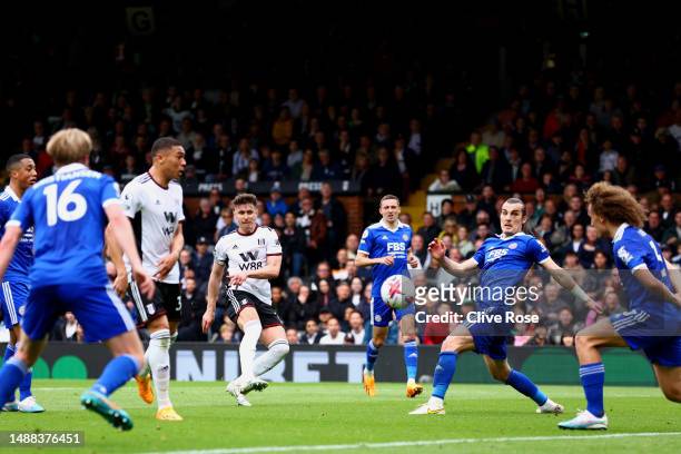 Tom Cairney of Fulham scores the team's third goal during the Premier League match between Fulham FC and Leicester City at Craven Cottage on May 08,...