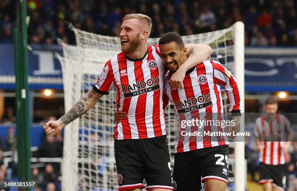 Oliver McBurnie of Sheffield United celebrates with teammate Iliman Ndiaye after scoring the team's first goal during the Sky Bet Championship...