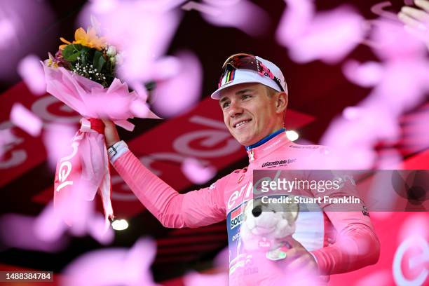 Remco Evenepoel of Belgium and Team Soudal - Quick Step celebrates at podium as Pink Leader Jersey winner during the 106th Giro d'Italia 2023, Stage...