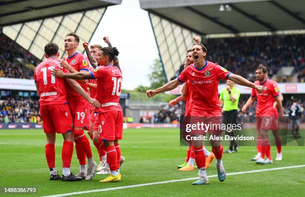 Ben Brereton Diaz of Blackburn Rovers celebrates with teammates after scoring the team's fourth goal during the Sky Bet Championship between Millwall...