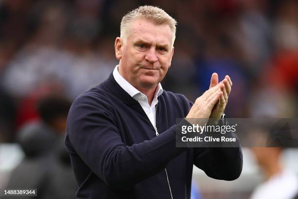 Dean Smith, Manager of Leicester City, applauds their fans after their side's defeat to Fulham during the Premier League match between Fulham FC and...