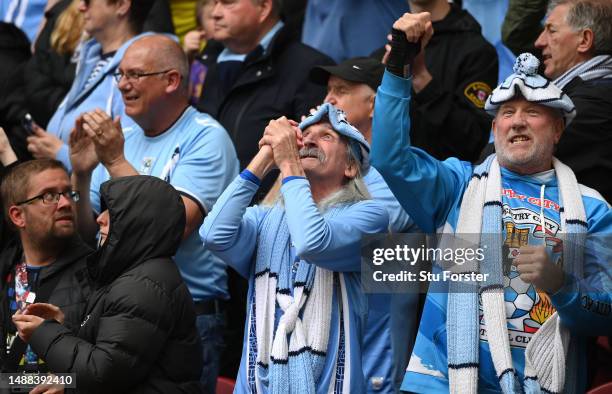 Coventry City fans celebrate as they make the play off's during the Sky Bet Championship between Middlesbrough and Coventry City at Riverside Stadium...