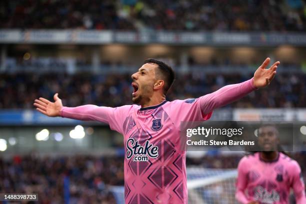 Dwight McNeil of Everton celebrates after Jason Steele of Brighton & Hove Albion scores an own goal during the Premier League match between Brighton...