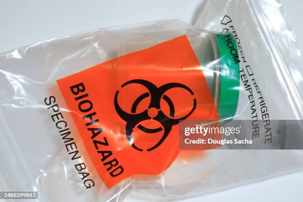 biohazard bag of medical waste - pistas stockfoto's en -beelden